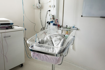 Intensive care unit room and crib for newborn