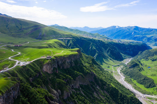 Caucasus mountains. Georgian Military Road. Kudskoe or Gudskoe gorge. Jvari pass near the ski resort Gudauri and Soviet Monument to Russo-Georgian Friendship.