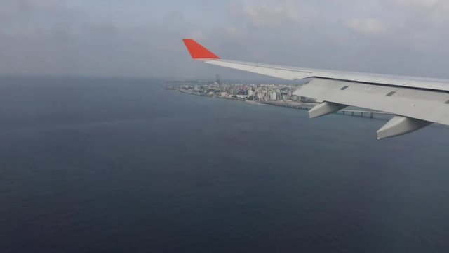 Flight of aircraft over the Maldives. Male.