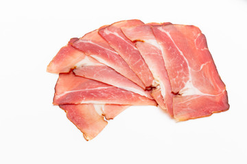 Hamon sliced on white background. Spanisch traditional meat.