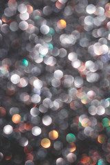 Obraz premium Multicolored defocused shiny confetti.