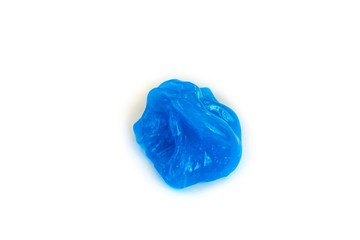 Modern toy for kids called slime. Transparent blue mucus isolated on a white background. 