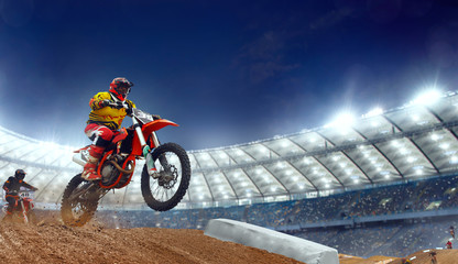 Motocross riders in action. Supercross. Motocross sport.