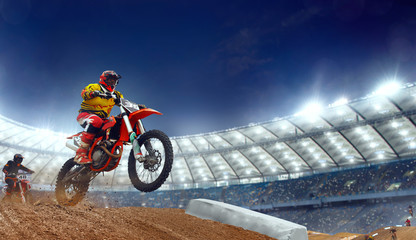 Motocross riders in action. Supercross. Motocross sport.