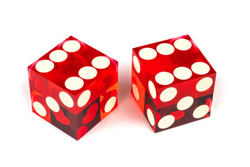 Two red glass luxury dices isolated against a white background. Six and six with shadow, full clipping. Macro shooting, selective focus.