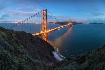 Foto auf Alu-Dibond Classic panoramic view of famous Golden Gate Bridge in beautiful evening light on a dusk with blue sky and clouds in summer or autumn, San Francisco, California, USA © Michal