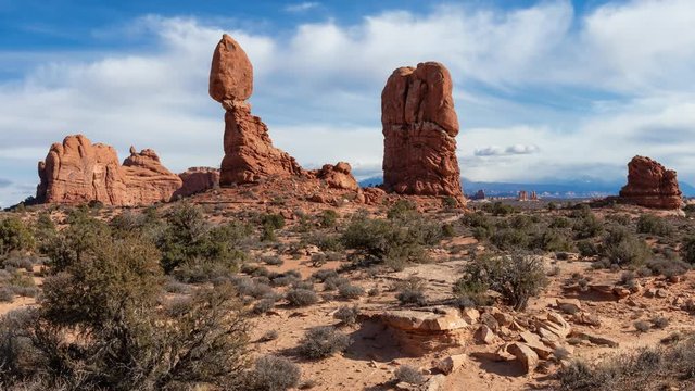 Landscape view of beautiful red rock canyon formations during a vibrant sunny day. Taken in Arches National Park, located near Moab, Utah, United States. Still Image Continuous Animation
