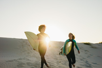 Women going for surfing