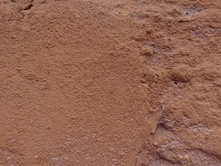 Part of a rough earthen wall