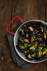 Seafood Mussels in Pan, Top View on Wooden Background, Copy Space