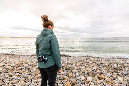 Strandhill, Sligo, Ireland: A woman looking out over the ocean.