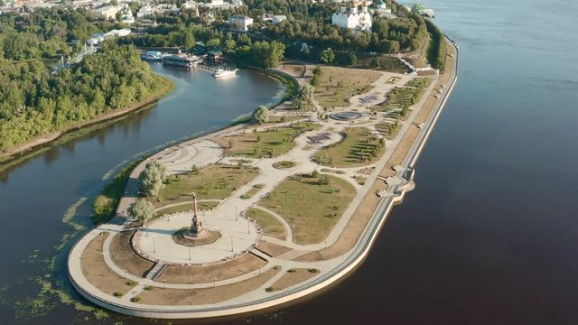 Scenic aerial view of famous Strelka park in place of confluence of Kotorosl and Volga rivers in ancient touristic historic town Yaroslavl in Russian Federation. Beautiful summer sunny look of park
