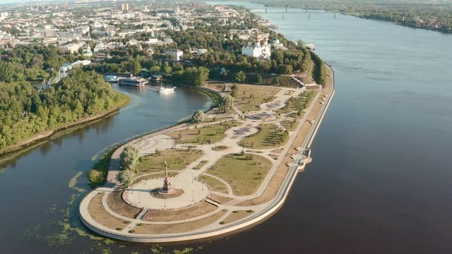 Scenic aerial view of famous Strelka park in place of confluence of Kotorosl and Volga rivers in ancient touristic historic town Yaroslavl in Russian Federation. Beautiful summer sunny look of park