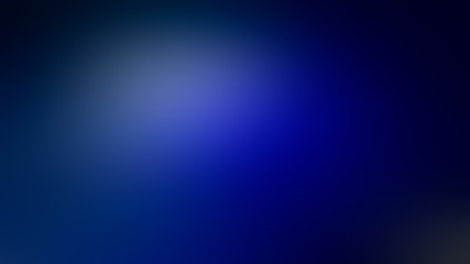 light spot on blue gradient abstract blurred background.