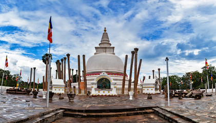 Panoramic view on a ancient stupa o Thuparamaya, with clouds as background. The stupa is constructed in 300 B.C. and contains Buddha's clavicle inside