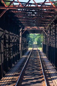 Old black railway bridge in Sri Lanka © Dymov