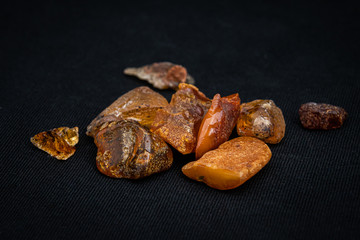 Amber Bernstein collection of beautiful pieces in different tones of yellow, orange, gold, brown, copper