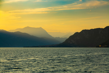 Naklejka na ściany i meble Idyllic sunset over Lake Como next to Lecco city, Lombardy, Italy