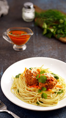 meatballs with pasta on a plate