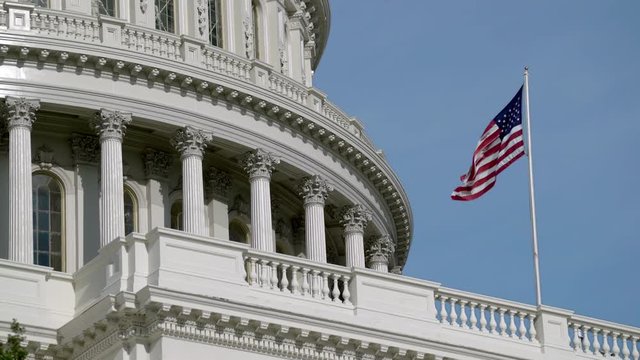 Washington DC Capitol Building Dome and American Flag Close Up