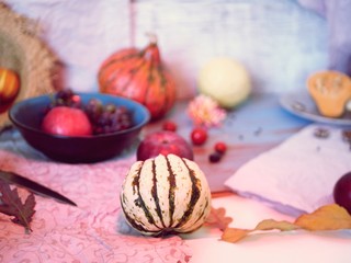 Pumpkins, grapes, fruits for cooking dessert on a wooden table, seasonal food, summer, autumn