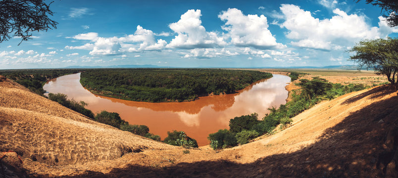 Amazing panoramic view of dirty Omo river on sunny day in Ethiopian countryside