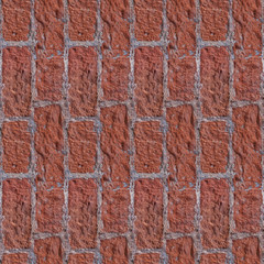 Seamless photo pattern of red brick wall. Suitable for town design or game levels.