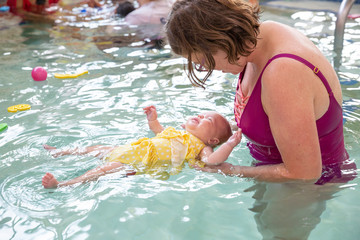 mother and daughter in swimming pool