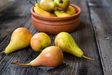Fresh organic pears on a old wooden table