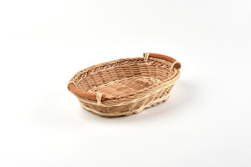 Wicker basket for serving isolated on white background