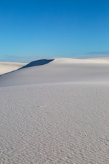 Fototapeta na wymiar White Sands Desert in New Mexico beneath a blue sky