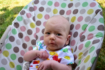 Fototapeta na wymiar Newborn baby. Blonde boy with blue eyes, seven weeks.