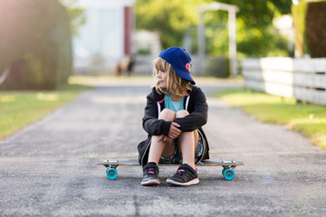 Little girl with skateboard