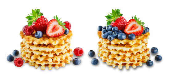 Waffles with fresh berries on a white background