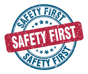 safety first stamp. safety first round grunge sign. safety first