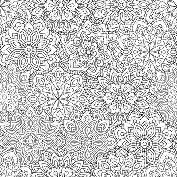 Seamless pattern of Mandala in ethnic oriental style. Decorative vintage flower for henna, yoga stuff, mehendi, tattoo, coloring book page. Zentangle inspired style.