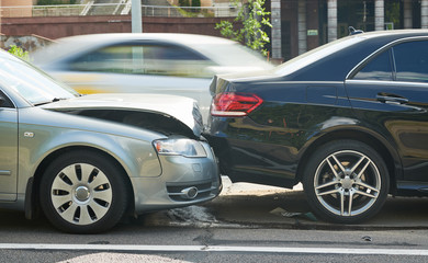 car crash accident on street. damaged automobiles