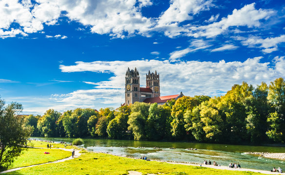 View on summer landscape by St. Maximilian church and Isar in Munich