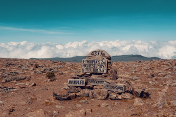 The highest peak of Bale Mountain with signpost tulu dimtu on the Sanetti Plateau in the Bale...