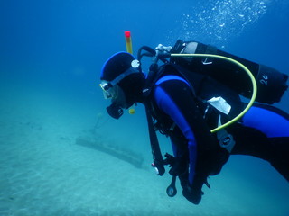 Scuba diving in the clear waters of the Mediterranean 
