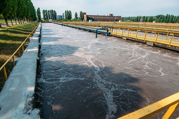 Tanks or reservoirs for cleansing sewage liquid with sludge in modern wastewater treatment plant