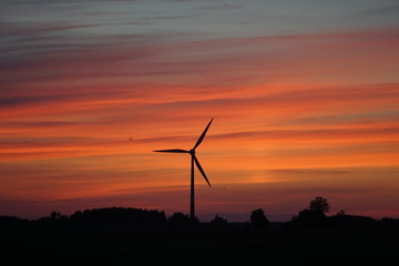 Fototapeta na wymiar wind turbines at sunset