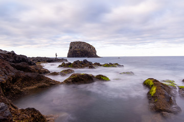 Fisherman on the Atlantic Ocean coast, Madeira island, Portugal
