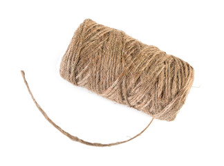 Spool of natural linen twine, isolated on white background, top view.