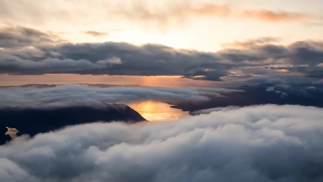 Aerial landscape view of Sunshine Coast during a vibrant and dramatic sunset. Taken Northwest of Vancouver, British Columbia, Canada. Still Image Continuous Animation