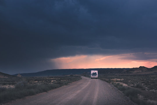 Trailer standing on side of empty road