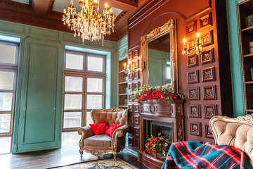 Luxury classic interior of home library. Sitting room with bookshelf, books, arm chair, sofa and fireplace. Clean and modern decoration with elegant furniture. Education read study wisdom concept