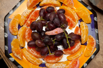 Grapes and orange section appetizer plate. St Paul Minnesota MN USA
