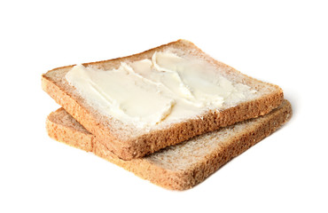 Slices of bread with butter isolated on white
