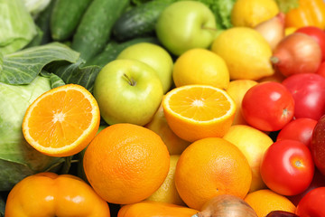 Colorful ripe fruits and vegetables as background, closeup